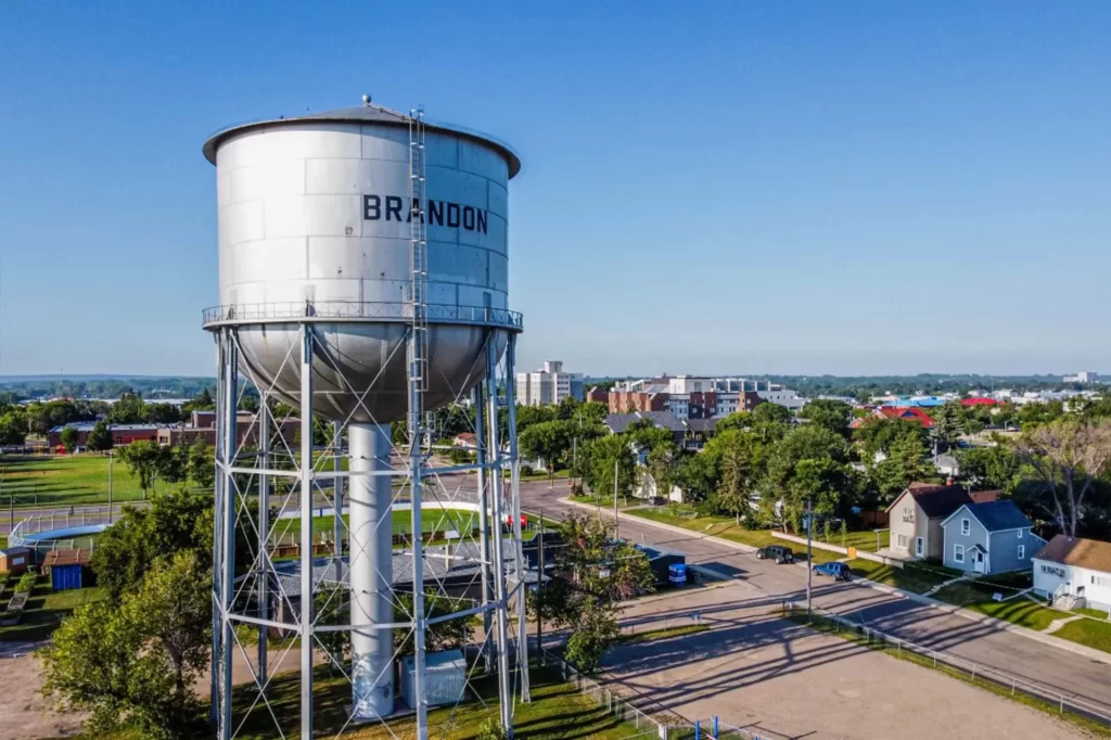 Brandon Therapists serving Brandon area. This photo is a water tower overlooking the cityscape of Brandon in Southern Manitoba.